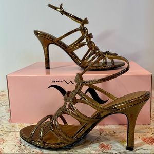 Strappy high heeled gold sandal
